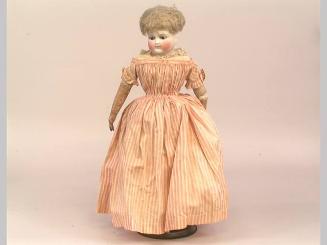 Doll: in pink and white striped dress