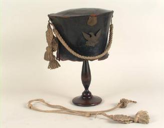 Bell crown cap and shoulder cord