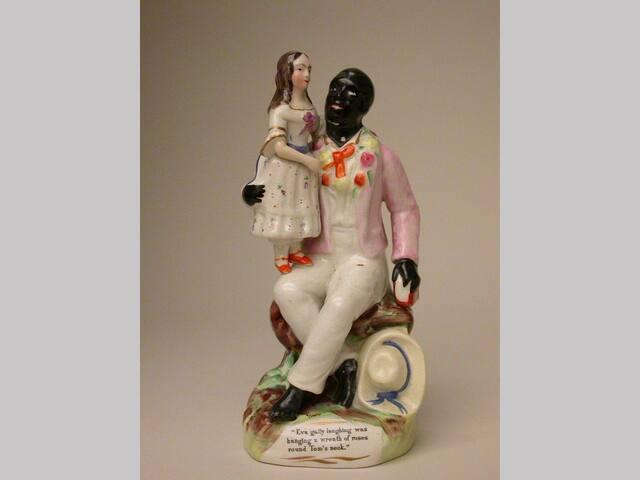 Figurine of Uncle Tom with Eva