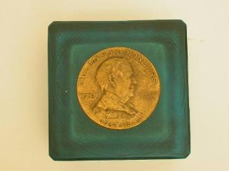 Paperweight with medal