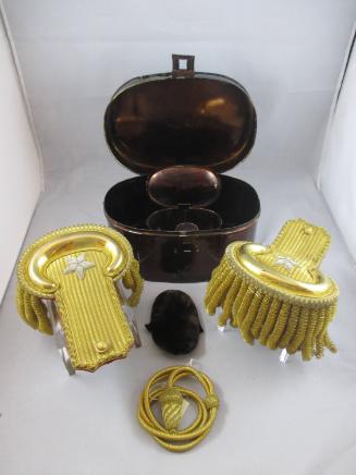 Epaulets and shoulder cord in storage box