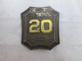 Badge on block in envelope: N.Y.F.D. 20