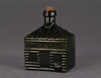 Log cabin bottle with cork