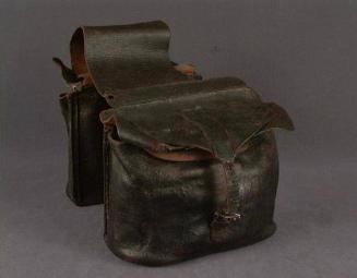 Physician's saddlebags with medicine bottles and bundles