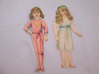 2 paper dolls and 2 outfits mounted