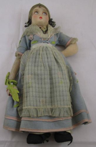 Doll on stand: peasant from Italy in box