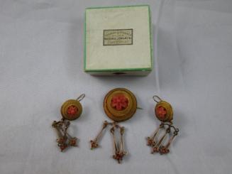 Brooch and earrings set in box