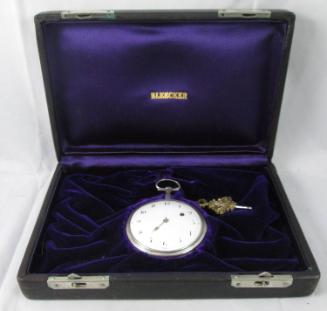 Pocket watch and key in case