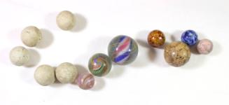 Colllection of marbles in box