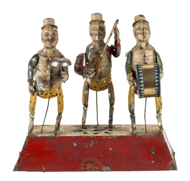 Three musicians windup toy