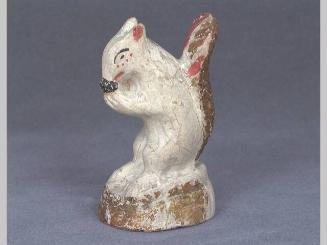 Chalkware squirrel with nut