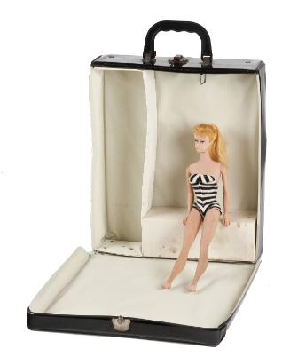 Barbie doll, swimsuit, and case