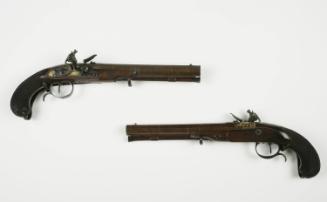 Pair of flintlock dueling pistols with case and accessories (57)