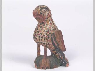 Woodcarving (parrot on green base)