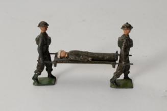 Stretcher carriers with wounded soldier