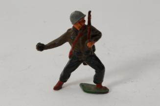 Infantryman throwing grenade