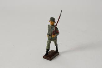 Nazi soldier marching at the slope