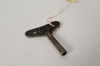 Clockwork key on cord