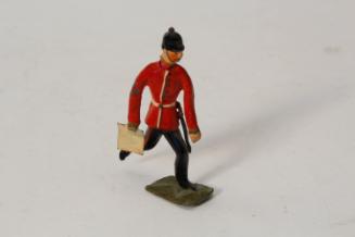 British soldier running with papers
