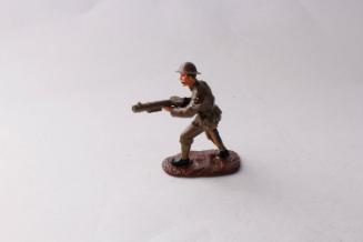 WWI British soldier firing with lewis gun