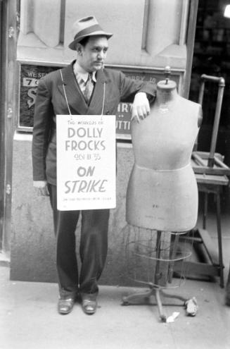 "WORKERS OF DOLLY FROCKS ON STRIKE"