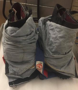 Fire-ready boots and insulated pants with suspenders