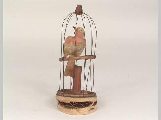 Squeak toy (bird in cage)