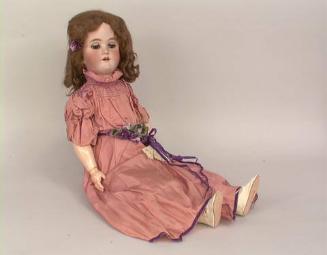 Doll: girl in pink gown w/violets