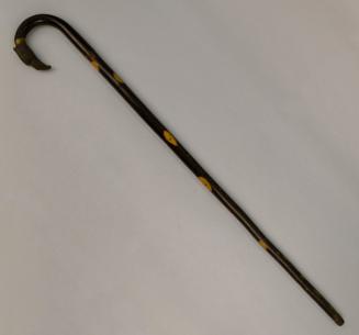 Walking-stick with removable sword