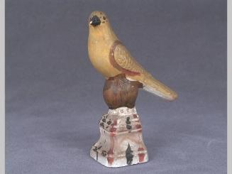 Chalkware bird on pedestal