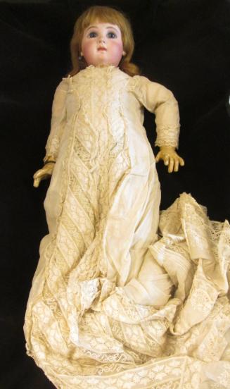 Doll: in long white dress