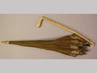 Parasol: brown & white w/oriental carved handle