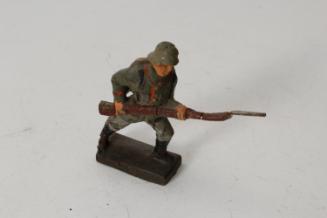 WWI German soldier advancing with rifle