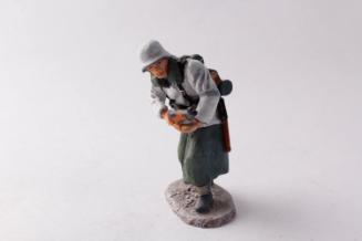 WWII German Army Waffen SS winter soldier advancing with rifle